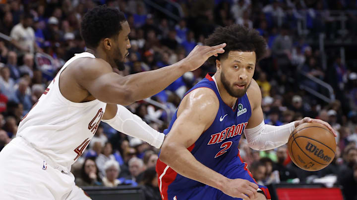 May 13, 2026; Detroit, Michigan, USA; Detroit Pistons guard Cade Cunningham (2) is defended by Cleveland Cavaliers guard Donovan Mitchell (45) in the second half during game five of the second round of the 2026 NBA Playoffs at Little Caesars Arena. Mandatory Credit: Rick Osentoski-Imagn Images