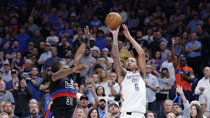 Mar 30, 2026; Oklahoma City, Oklahoma, USA; Oklahoma City Thunder forward Jaylin Williams (6) shoots a three point basket beside Detroit Pistons guard Javonte Green (31) during the second half at Paycom Center. Mandatory Credit: Alonzo Adams-Imagn Images Mar 30, 2026; Oklahoma City, Oklahoma, USA; Oklahoma City Thunder forward Jaylin Williams (6) shoots a three point basket beside Detroit Pistons guard Javonte Green (31) during the second half at Paycom Center. Mandatory Credit: Alonzo Adams-Imagn Images