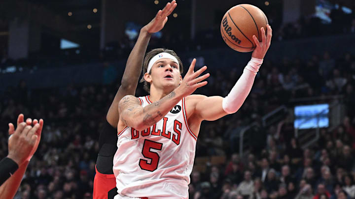 Feb 5, 2026; Toronto, Ontario, CAN;  Chicago Bulls guard Mac Mcclung (5) drives against the Toronto Raptors in the second half at Scotiabank Arena. Mandatory Credit: Dan Hamilton-Imagn Images
