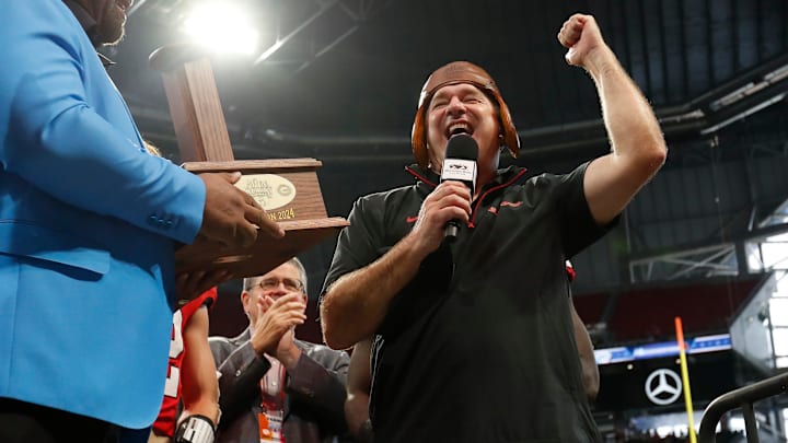 Georgia coach Kirby Smart celebrates after winning the NCAA Aflac Kickoff Game in Atlanta, on Saturday, Aug. 31, 2024. Georgia won 34-3.