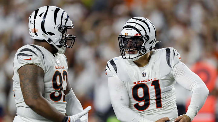 Sep 25, 2023; Cincinnati, Ohio, USA; Cincinnati Bengals defensive end Trey Hendrickson (91) reacts after a play with defensive tackle BJ Hill (92) in the second half against the Los Angeles Rams at Paycor Stadium. Mandatory Credit: Katie Stratman-Imagn Images