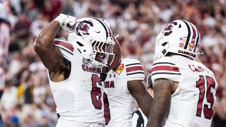 Dec 31, 2024; Orlando, FL, USA; South Carolina Gamecocks running back Dylan Stewart (6) celebrates his touchdown against the Illinois Fighting Illini in the fourth quarter at Camping World Stadium. Mandatory Credit: Jeremy Reper-Imagn Images Dec 31, 2024; Orlando, FL, USA; South Carolina Gamecocks running back Dylan Stewart (6) celebrates his touchdown against the Illinois Fighting Illini in the fourth quarter at Camping World Stadium. Mandatory Credit: Jeremy Reper-Imagn Images