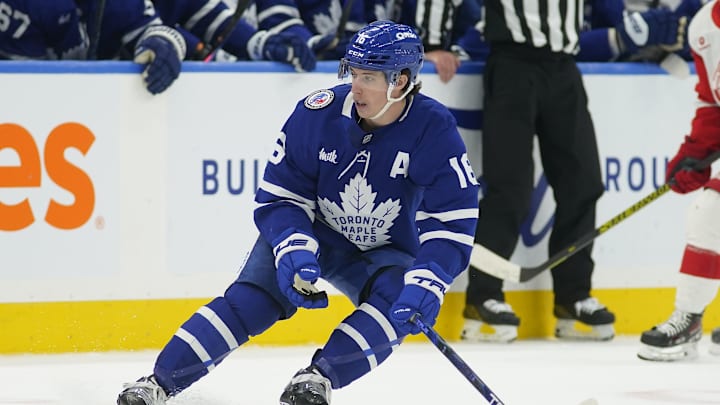 Nov 8, 2024; Toronto, Ontario, CAN; Toronto Maple Leafs forward Mitch Marner (16) skates against the Detroit Red Wings during the third period at Scotiabank Arena. Mandatory Credit: John E. Sokolowski-Imagn Images