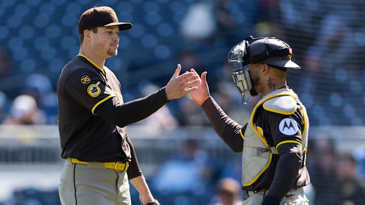Apr 8, 2026; Pittsburgh, Pennsylvania, USA;  San Diego Padres pitcher Mason Miller (22) and catcher Luis Campusano (12) shake hands after defeating the Pittsburgh Pirates at PNC Park. Mandatory Credit: Scott Galvin-Imagn Images