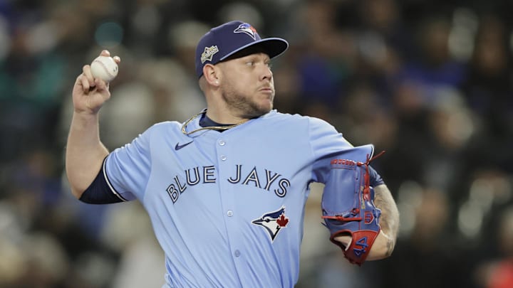 Oct 15, 2025; Seattle, Washington, USA; Toronto Blue Jays pitcher Yariel Rodriguez (29) throws in the eighth inning against the Seattle Mariners during game three of the ALCS round for the 2025 MLB playoffs at T-Mobile Park. Mandatory Credit: John Froschauer-Imagn Images Oct 15, 2025; Seattle, Washington, USA; Toronto Blue Jays pitcher Yariel Rodriguez (29) throws in the eighth inning against the Seattle Mariners during game three of the ALCS round for the 2025 MLB playoffs at T-Mobile Park. Mandatory Credit: John Froschauer-Imagn Images