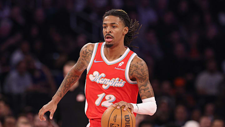 Jan 27, 2025; New York, New York, USA; Memphis Grizzlies guard Ja Morant (12) dribbles up court during the first half against the Memphis Grizzlies at Madison Square Garden. Mandatory Credit: Vincent Carchietta-Imagn Images