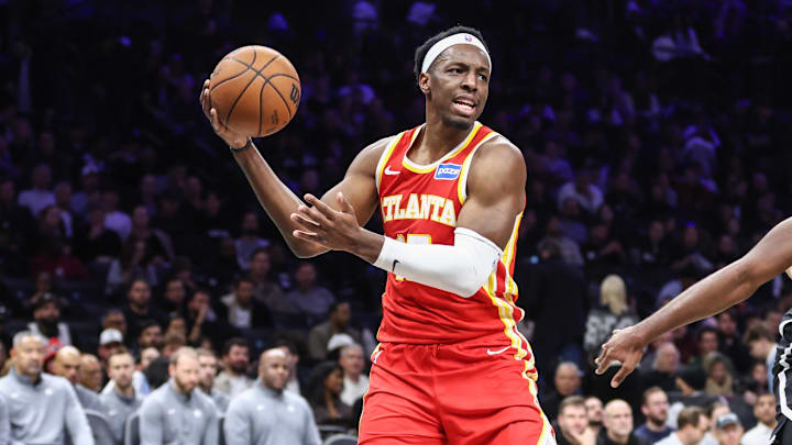 Oct 29, 2025; Brooklyn, New York, USA; Atlanta Hawks forward Onyeka Okongwu (17) grabs a rebound in the second quarter against the Brooklyn Nets at Barclays Center. Mandatory Credit: Wendell Cruz-Imagn Images