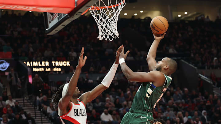Feb 6, 2023; Portland, Oregon, USA; Milwaukee Bucks forward Khris Middleton (22) shoots the ball over Portland Trail Blazers forward Jerami Grant (9) in the first half at Moda Center. Mandatory Credit: Jaime Valdez-Imagn Images Feb 6, 2023; Portland, Oregon, USA; Milwaukee Bucks forward Khris Middleton (22) shoots the ball over Portland Trail Blazers forward Jerami Grant (9) in the first half at Moda Center. Mandatory Credit: Jaime Valdez-Imagn Images