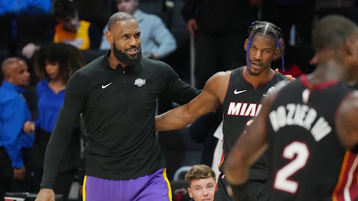 Dec 4, 2024; Miami, Florida, USA; Los Angeles Lakers forward LeBron James (23) and Miami Heat forward Jimmy Butler (22) greet each other following the game at the Kaseya Center. Mandatory Credit: Jim Rassol-Imagn Images Dec 4, 2024; Miami, Florida, USA; Los Angeles Lakers forward LeBron James (23) and Miami Heat forward Jimmy Butler (22) greet each other following the game at the Kaseya Center. Mandatory Credit: Jim Rassol-Imagn Images