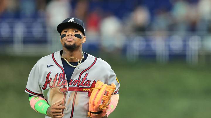 Sep 25, 2026; Miami, Florida, USA; Atlanta Braves right fielder Ronald Acuña Jr. (13) returns to the dugout against the Miami Marlins during the first inning at loanDepot Park. Mandatory Credit: Sam Navarro-Imagn Images