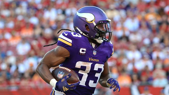 Sep 27, 2026; Tampa, Florida, USA; Minnesota Vikings running back Aaron Jones Sr. (33) carries the ball against the Tampa Bay Buccaneers during the third quarter at Raymond James Stadium. Mandatory Credit: Kim Klement Neitzel-Imagn Images Sep 27, 2026; Tampa, Florida, USA; Minnesota Vikings running back Aaron Jones Sr. (33) carries the ball against the Tampa Bay Buccaneers during the third quarter at Raymond James Stadium. Mandatory Credit: Kim Klement Neitzel-Imagn Images