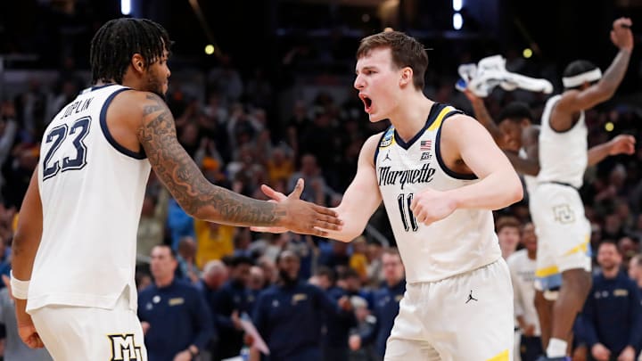 Marquette Golden Eagles forward David Joplin (23) and Marquette Golden Eagles guard Tyler Kolek (11)