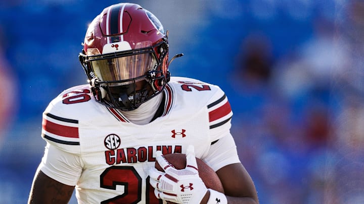 Sep 7, 2024; Lexington, Kentucky, USA; South Carolina Gamecocks tight end Michael Smith (20) runs the ball during the fourth quarter against the Kentucky Wildcats at Kroger Field. Mandatory Credit: Jordan Prather-Imagn Images Sep 7, 2024; Lexington, Kentucky, USA; South Carolina Gamecocks tight end Michael Smith (20) runs the ball during the fourth quarter against the Kentucky Wildcats at Kroger Field. Mandatory Credit: Jordan Prather-Imagn Images