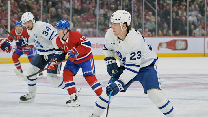 Mar 10, 2026; Montreal, Quebec, CAN; Toronto Maple Leafs forward Matthew Knies (23) plays the puck against the Montreal Canadiens during the first period at the Bell Centre. Mandatory Credit: Eric Bolte-Imagn Images