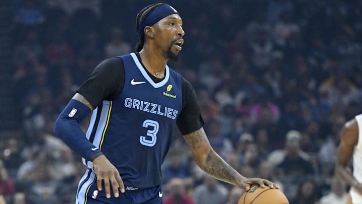 Nov 15, 2025; Cleveland, Ohio, USA; Memphis Grizzlies guard Kentavious Caldwell-Pope (3) brings the ball up court in the first quarter against the Cleveland Cavaliers at Rocket Arena. Mandatory Credit: David Richard-Imagn Images