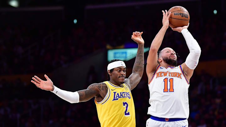 Mar 6, 2025; Los Angeles, California, USA; New York Knicks guard Jalen Brunson (11) shoots ahead of Los Angeles Lakers forward Jarred Vanderbilt (2) during the first half at Crypto.com Arena. Mandatory Credit: Gary A. Vasquez-Imagn Images