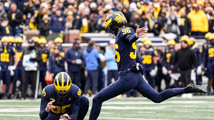 Michigan kicker Dominic Zvada (96) attempts a field goal against Ohio State during the first half at Michigan Stadium in Ann Arbor on Saturday, Nov. 29, 2025.