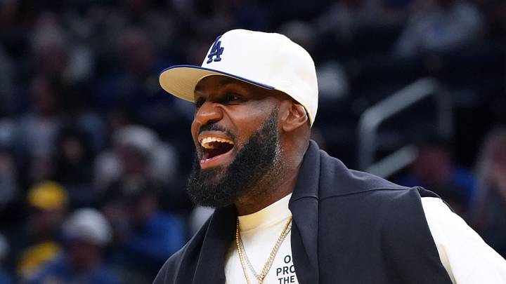 San Francisco, California, USA; Los Angeles Lakers forward LeBron James (23), wearing a Los Angeles Dodgers hat, watches from the sideline during a break against the Golden State Warriors in the third quarter at Chase Center. Mandatory Credit: David Gonzales-Imagn Images San Francisco, California, USA; Los Angeles Lakers forward LeBron James (23), wearing a Los Angeles Dodgers hat, watches from the sideline during a break against the Golden State Warriors in the third quarter at Chase Center. Mandatory Credit: David Gonzales-Imagn Images