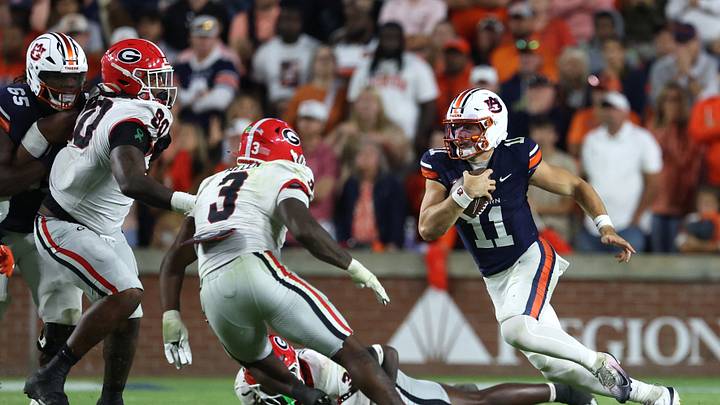 Oct 11, 2025; Auburn, Alabama, USA; Auburn Tigers quarterback Jackson Arnold (11) carries during the fourth quarter against the Georgia Bulldogs at Jordan-Hare Stadium. Mandatory Credit: John Reed-Imagn Images Oct 11, 2025; Auburn, Alabama, USA; Auburn Tigers quarterback Jackson Arnold (11) carries during the fourth quarter against the Georgia Bulldogs at Jordan-Hare Stadium. Mandatory Credit: John Reed-Imagn Images