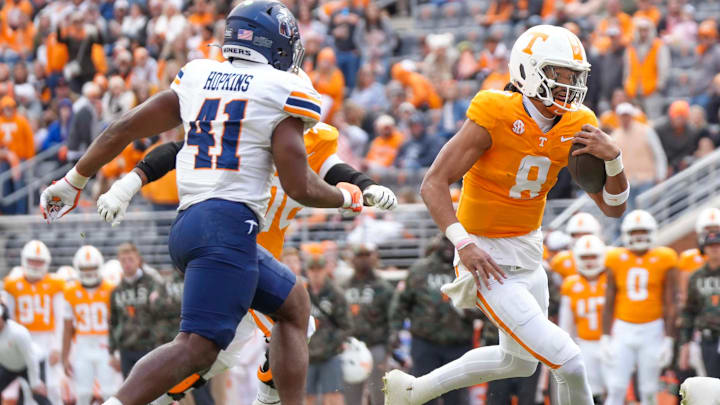 Nov 23, 2024; Knoxville, Tennessee, USA; Tennessee Volunteers quarterback Nico Iamaleava (8) runs with the ball against the UTEP Miners during the first half at Neyland Stadium. Mandatory Credit: Angelina Alcantar/USA TODAY Network via Imagn Images