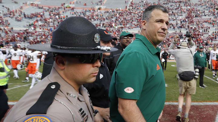 Oct 15, 2022; Blacksburg, Virginia, USA; Miami Hurricanes head coach Mario Cristobal leaves the field after the game against the Virginia Tech Hokies at Lane Stadium. Mandatory Credit: Reinhold Matay-Imagn Images Oct 15, 2022; Blacksburg, Virginia, USA; Miami Hurricanes head coach Mario Cristobal leaves the field after the game against the Virginia Tech Hokies at Lane Stadium. Mandatory Credit: Reinhold Matay-Imagn Images
