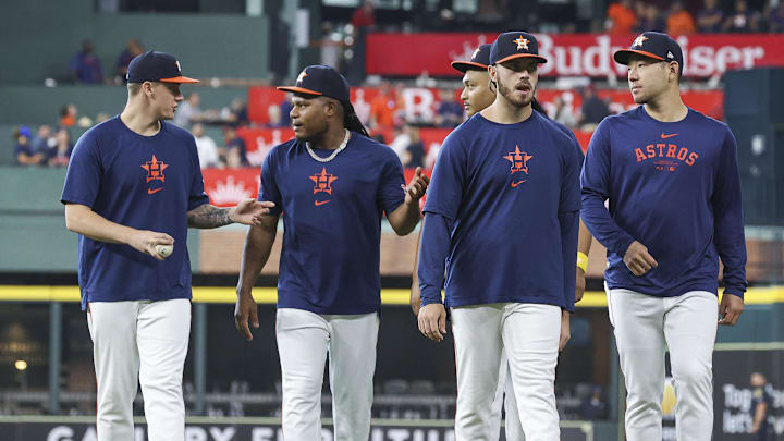 Sep 1, 2024; Houston, Texas, USA; Houston Astros starting pitchers Hunter Brown (58) and Framber Valdez (59) and Spencer Arrighetti (41) and Yusei Kikuchi (16) walk on the field before the game against the Kansas City Royals at Minute Maid Park. Mandatory Credit: Troy Taormina-Imagn Images
