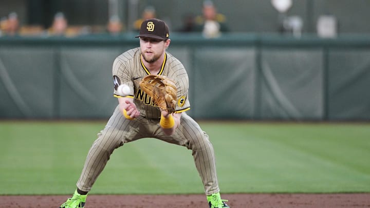 Apr 7, 2025; West Sacramento, California, USA; San Diego Padres first base Jake Cronenworth (9) catches the force out at second base during the first inning of the game against the Athletics at Sutter Health Park. Mandatory Credit: Ed Szczepanski-Imagn Images