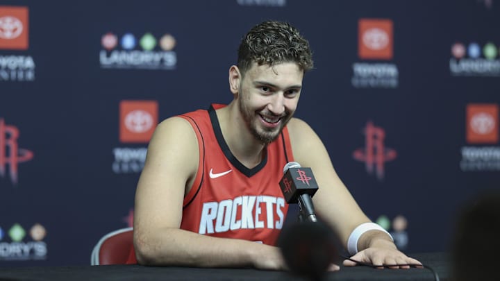 Sep 30, 2024; Houston, TX, USA; Houston Rockets center Alperen Sengun (28) speaks during Houston Rockets media day. Mandatory Credit: Troy Taormina-Imagn Images