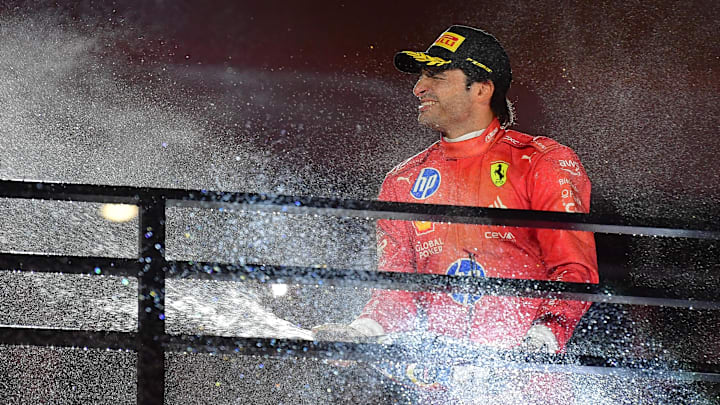 Nov 23, 2024; Las Vegas, Nevada, USA; Scuderia Ferrari driver Carlos Sainz (55) celebrates after placing third in the Las Vegas Grand Prix at Las Vegas Circuit. Mandatory Credit: Gary A. Vasquez-Imagn Images Nov 23, 2024; Las Vegas, Nevada, USA; Scuderia Ferrari driver Carlos Sainz (55) celebrates after placing third in the Las Vegas Grand Prix at Las Vegas Circuit. Mandatory Credit: Gary A. Vasquez-Imagn Images