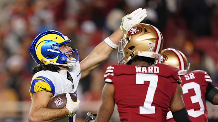 Dec 12, 2024; Santa Clara, California, USA; Los Angeles Rams wide receiver Puka Nacua (17) reacts after making a catch for a first down next to San Francisco 49ers cornerback Charvarius Ward (7) in the fourth quarter at Levi's Stadium. Mandatory Credit: Cary Edmondson-Imagn Images Dec 12, 2024; Santa Clara, California, USA; Los Angeles Rams wide receiver Puka Nacua (17) reacts after making a catch for a first down next to San Francisco 49ers cornerback Charvarius Ward (7) in the fourth quarter at Levi's Stadium. Mandatory Credit: Cary Edmondson-Imagn Images
