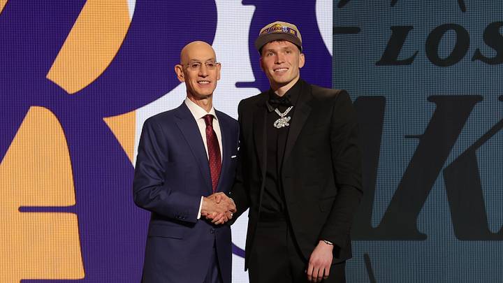 Jun 26, 2024; Brooklyn, NY, USA; Dalton Knecht poses for photos with NBA commissioner Adam Silver after being selected in the first round by the Los Angeles Lakers in the 2024 NBA Draft at Barclays Center. Mandatory Credit: Brad Penner-Imagn Images