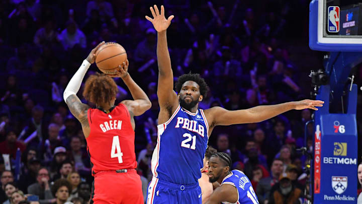 Feb 13, 2023; Philadelphia, Pennsylvania, USA; Houston Rockets guard Jalen Green (4) shoots over Philadelphia 76ers center Joel Embiid (21) during the third quarter at Wells Fargo Center. Mandatory Credit: Eric Hartline-Imagn Images