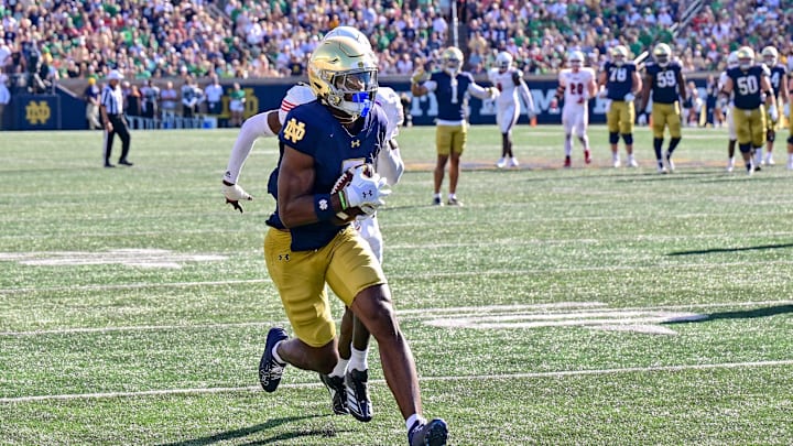 Sep 21, 2024; South Bend, Indiana, USA; Notre Dame Fighting Irish wide receiver Beaux Collins (5) catches a pass for a touchdown in the second quarter against the Miami Redhawks at Notre Dame Stadium. Mandatory Credit: Matt Cashore-Imagn Images