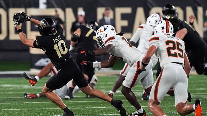 Sep 18, 2026; Winston-Salem, North Carolina, USA; Wake Forest Demon Deacons wide receiver Jack Foley (10) reaches out for the catch chased by Miami (FL) Hurricanes linebacker Mohamed Toure (1) during the second half at Allegacy Federal Credit Union Stadium. Mandatory Credit: Jim Dedmon-Imagn Images Sep 18, 2026; Winston-Salem, North Carolina, USA; Wake Forest Demon Deacons wide receiver Jack Foley (10) reaches out for the catch chased by Miami (FL) Hurricanes linebacker Mohamed Toure (1) during the second half at Allegacy Federal Credit Union Stadium. Mandatory Credit: Jim Dedmon-Imagn Images