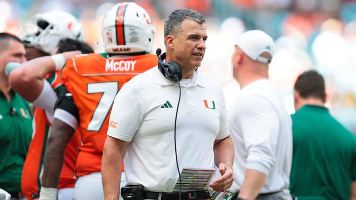 Oct 24, 2026; Miami Gardens, Florida, USA; Miami Hurricanes head coach Mario Cristobal looks on from the field against the Pittsburgh Panthers during the third quarter at Hard Rock Stadium. Mandatory Credit: Sam Navarro-Imagn Images