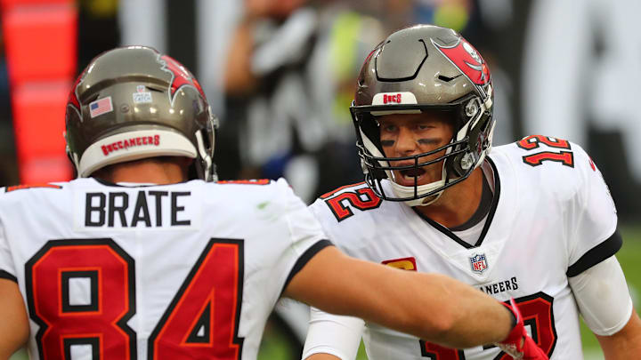 Tampa Bay Buccaneers quarterback Tom Brady celebrates with tight end Cameron Brate. Tampa Bay Buccaneers quarterback Tom Brady celebrates with tight end Cameron Brate.