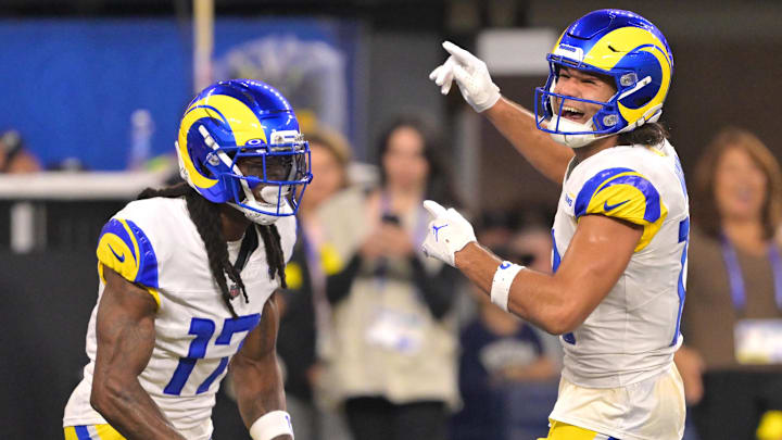 Nov 23, 2025; Inglewood, California, USA; Los Angeles Rams wide receiver Davante Adams (17) celebrates with wide receiver Puka Nacua (12) after a touchdown against the Tampa Bay Buccaneers at SoFi Stadium. Mandatory Credit: Jayne Kamin-Oncea-Imagn Images