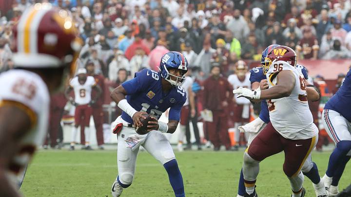 Oct 11, 2026; Landover, Maryland, USA; New York Giants quarterback Jameis Winston (19) scrambles from Washington Commanders defensive tackle Shy Tuttle (96) during the third quarter at Northwest Stadium. Oct 11, 2026; Landover, Maryland, USA; New York Giants quarterback Jameis Winston (19) scrambles from Washington Commanders defensive tackle Shy Tuttle (96) during the third quarter at Northwest Stadium.