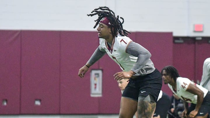 Florida State football players Patrick Payton (11) and Marvin Jones Jr. (7) take part in the final Tour of Duty winter workouts ahead of 2024 spring practices on Thursday, March 7, 2024.