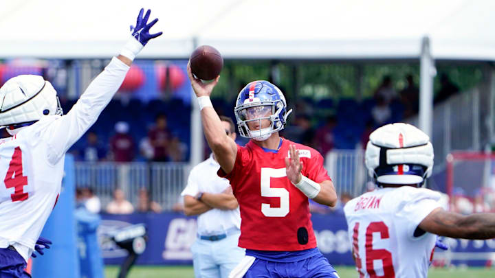 New York Giants quarterback Tommy DeVito (5) throws the ball during training camp in East Rutherford