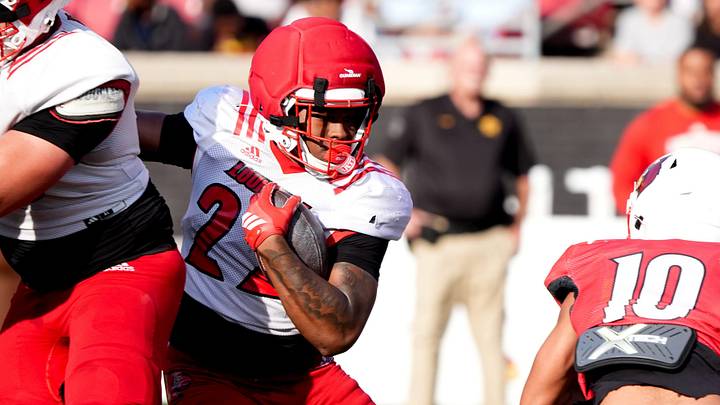 Louisville’s Lekhy Thompkins runs the ball against Louisville’s Kaleb Beasley in the Spring Football game
April 17, 2026