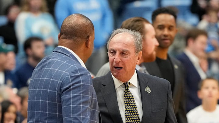 Dec 14, 2024; Chapel Hill, North Carolina, USA; North Carolina Tar Heels head coach Hubert Davis with La Salle Explorers head coach Fran Dunphy before the game at Dean E. Smith Center. Mandatory Credit: Bob Donnan-Imagn Images