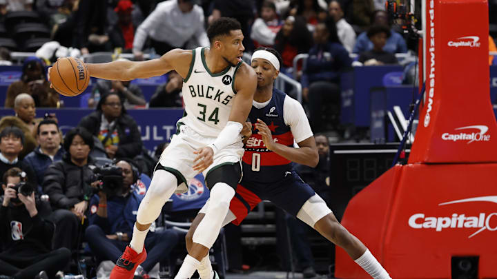 Dec 1, 2025; Washington, District of Columbia, USA; Milwaukee Bucks forward Giannis Antetokounmpo (34) drives to the basket as Washington Wizards guard Bilal Coulibaly (0) defends in the third quarter at Capital One Arena. Mandatory Credit: Geoff Burke-Imagn Images