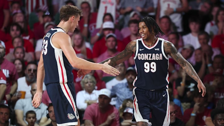 Gonzaga Bulldogs guard Khalif Battle (99) celebrates with Gonzaga Bulldogs forward Ben Gregg (33). 