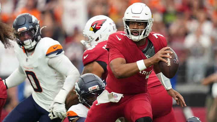 Arizona Cardinals quarterback Jacoby Brissett (7) escapes from the pocket as Denver Broncos linebacker Nik Bonitto (15) dives after him at State Farm Stadium in Glendale on Oct. 25, 2026. Arizona Cardinals quarterback Jacoby Brissett (7) escapes from the pocket as Denver Broncos linebacker Nik Bonitto (15) dives after him at State Farm Stadium in Glendale on Oct. 25, 2026.
