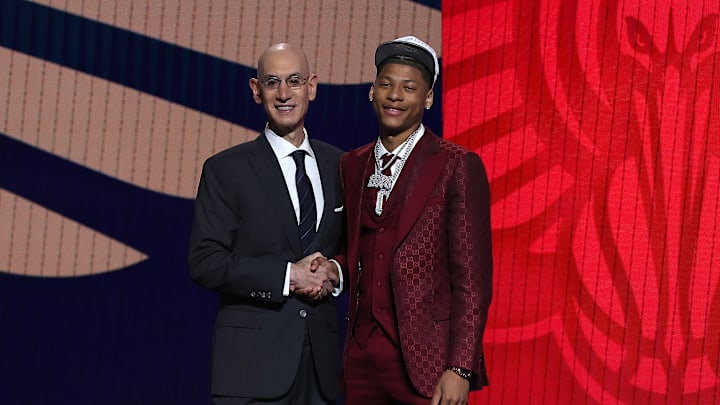 Jeremiah Fears, Adam Silver at the2025 NBA Draft - Round One
