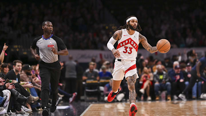 Mar 23, 2024; Washington, District of Columbia, USA;  Toronto Raptors guard Gary Trent Jr. (33) brings the ball up the court against the Wizards. 