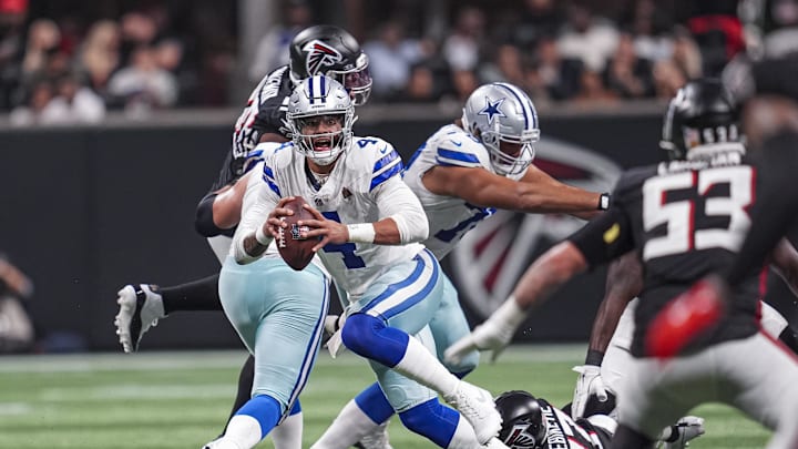  Dallas Cowboys quarterback Dak Prescott runs out of the pocket against the Atlanta Falcons during the second half