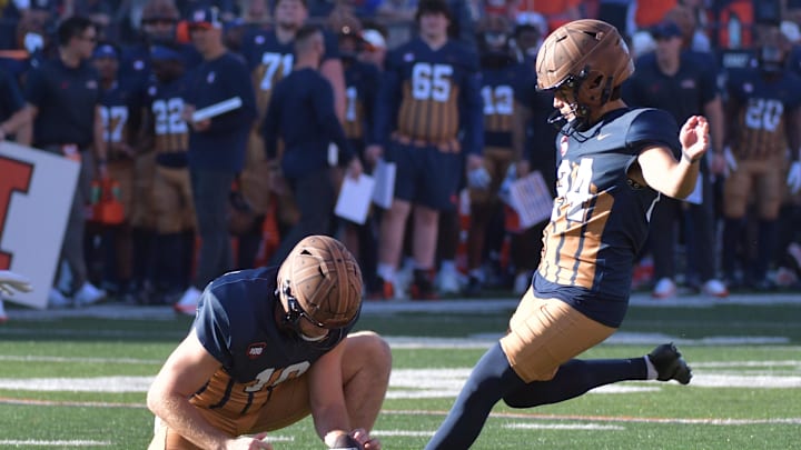 Oct 19, 2024; Champaign, Illinois, USA; Illinois fighting Illini kicker David Alano kicks a field goal against the Michigan Wolverines during the first half at Memorial Stadium. Mandatory Credit: Ron Johnson-Imagn Images Oct 19, 2024; Champaign, Illinois, USA; Illinois fighting Illini kicker David Alano kicks a field goal against the Michigan Wolverines during the first half at Memorial Stadium. Mandatory Credit: Ron Johnson-Imagn Images