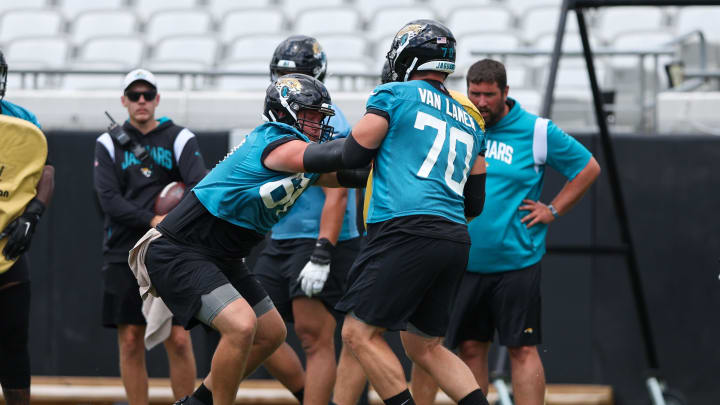 Jun 13, 2023; Jacksonville, Florida, USA;  Jacksonville Jaguars offensive tackle Chandler Brewer (67) and offensive tackle Cole Van Lanen (70) participate in mandatory mini camp at TIAA Bank field. Mandatory Credit: Nathan Ray Seebeck-USA TODAY Sports